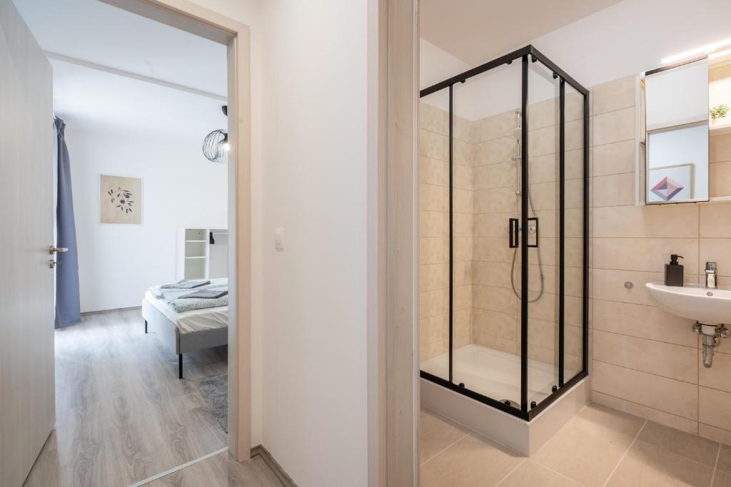 Kúpeľňa v ubytovaní Szabolcs Apartments