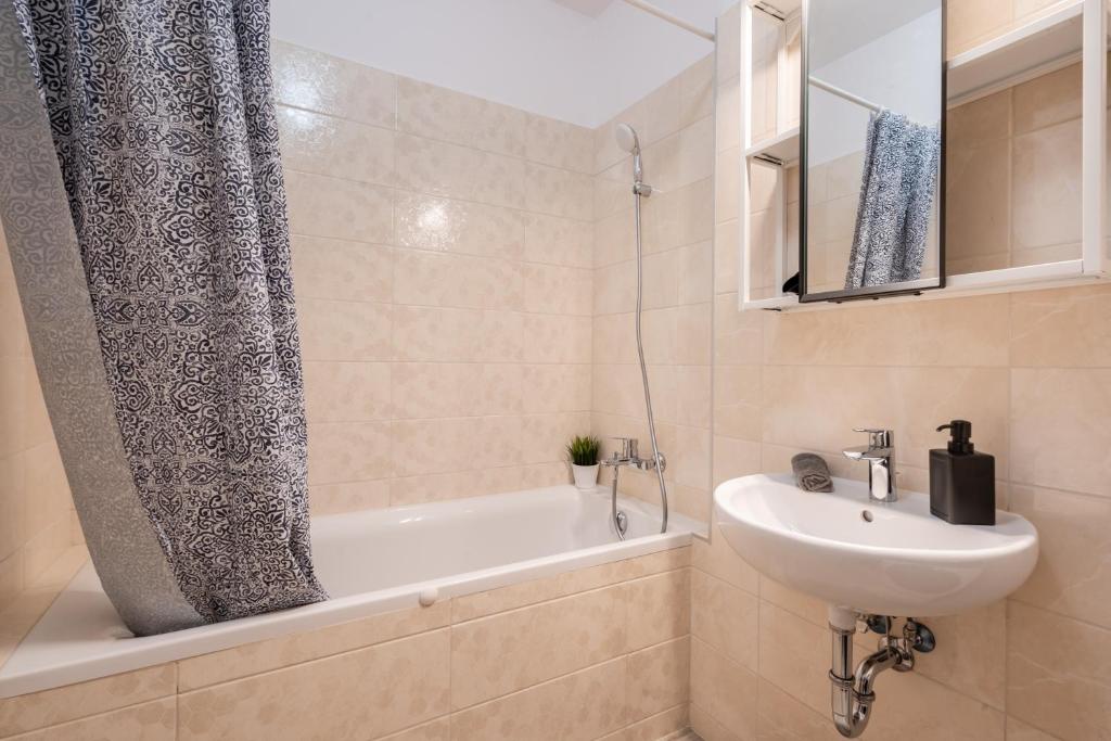 Kúpeľňa v ubytovaní Szabolcs Apartments