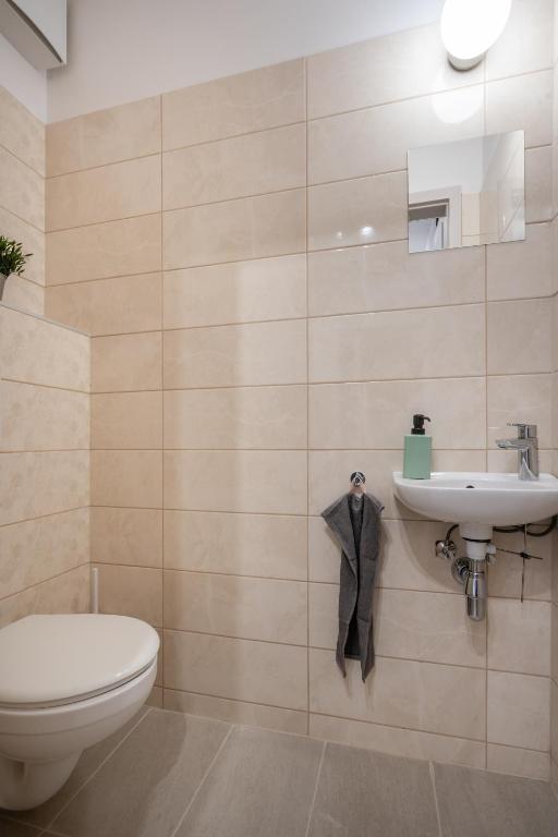 Kúpeľňa v ubytovaní Szabolcs Apartments