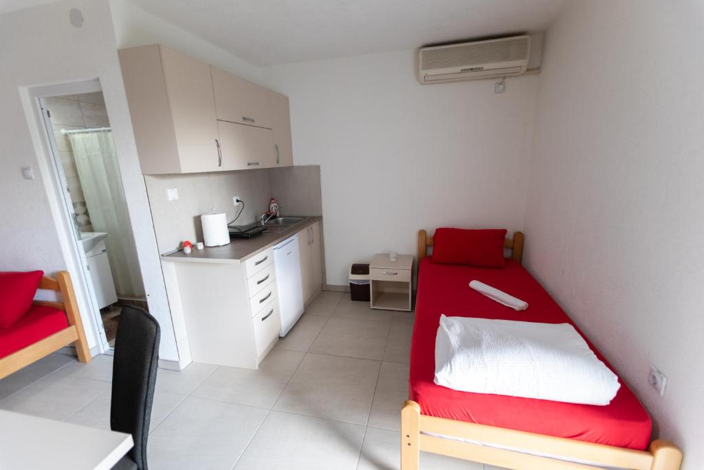 Kuchyň nebo kuchyňský kout v ubytování Ivy Love Apartmani