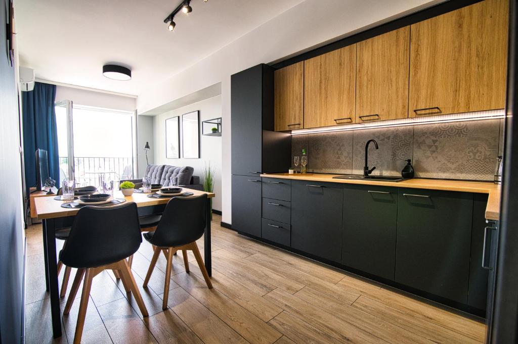 Kuchyňa alebo kuchynka v ubytovaní Apartament Timi Zator by Housine