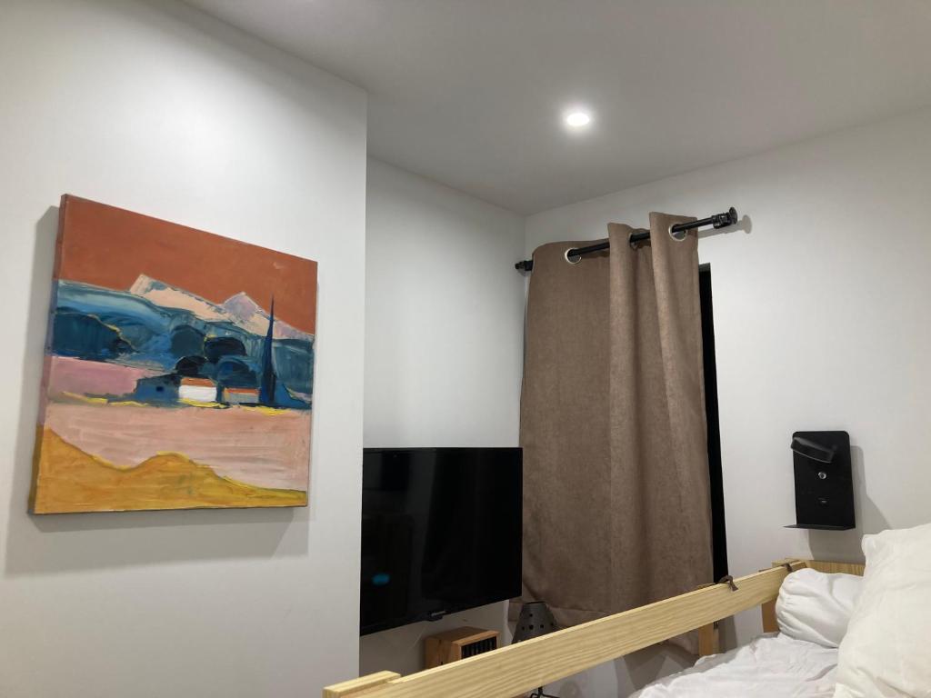 Telewizja i/lub zestaw kina domowego w obiekcie Chez Marie-Pierre