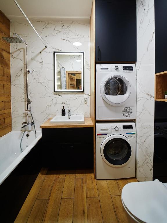 Fotografia z galérie ubytovania Apartament ,, COŚ NIECOŚ ,, Suwałki LOFT, KLIMATYZACJA, PRYWATNY PARKING, MONITOROWANE ZAMKNIĘTE OSIEDLE v destinácii Suwałki