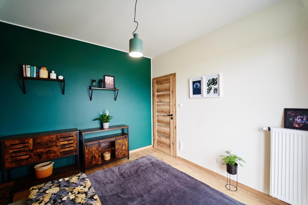 Fotografia z galérie ubytovania Apartament ,, COŚ NIECOŚ ,, Suwałki LOFT, KLIMATYZACJA, PRYWATNY PARKING, MONITOROWANE ZAMKNIĘTE OSIEDLE v destinácii Suwałki