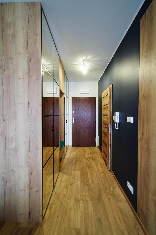 Fotografia z galérie ubytovania Apartament ,, COŚ NIECOŚ ,, Suwałki LOFT, KLIMATYZACJA, PRYWATNY PARKING, MONITOROWANE ZAMKNIĘTE OSIEDLE v destinácii Suwałki