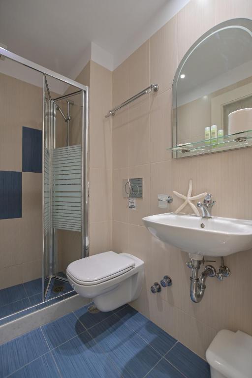 Koupelna v ubytování Hotel Zeus