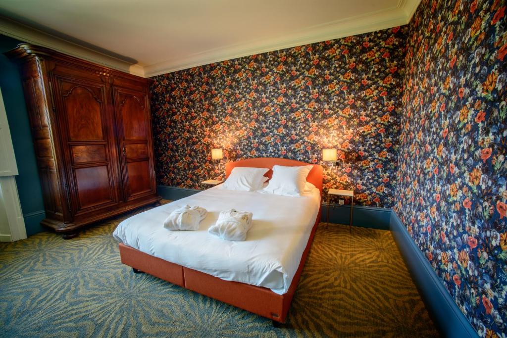 Postel nebo postele na pokoji v ubytování Château Origny - Moulins