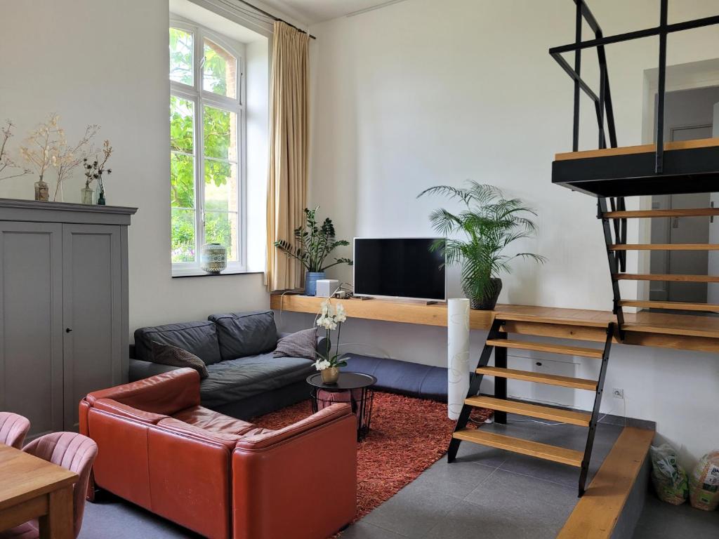 TV a/nebo společenská místnost v ubytování Mille Fleurs - apartments