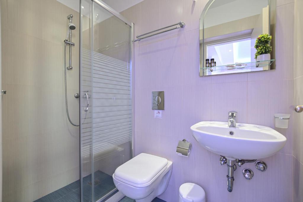 Koupelna v ubytování Hotel Zeus