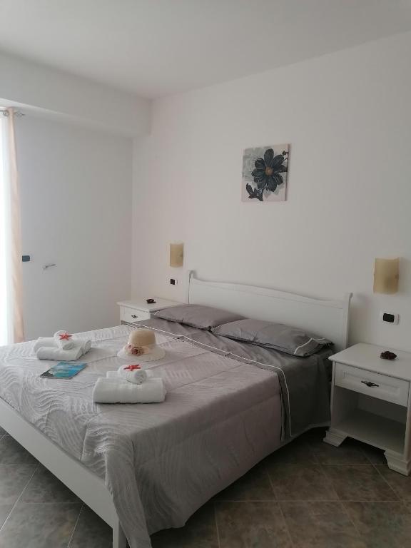 Postel nebo postele na pokoji v ubytování L'Alba