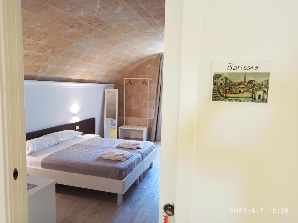 Postel nebo postele na pokoji v ubytování In & Out Matera