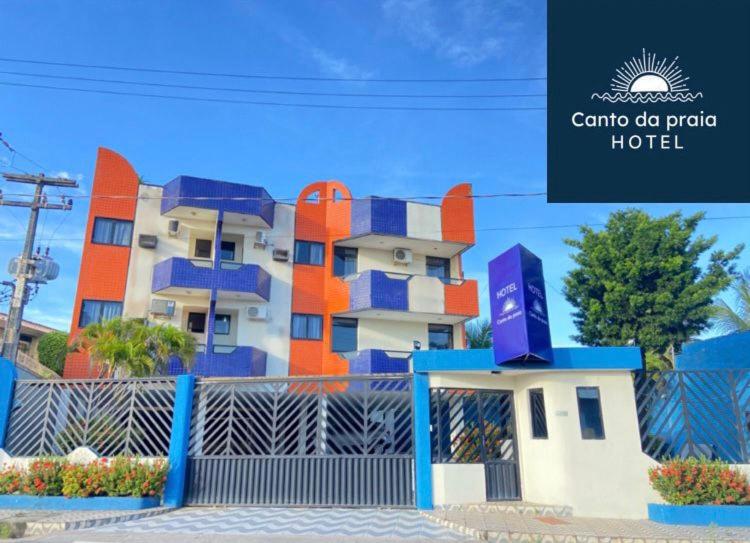 a rendering of a building with a sign on it at Hotel Canto Da Praia in São Luís