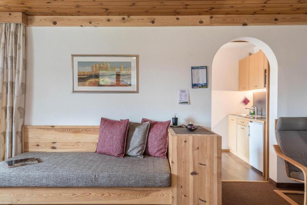 Posteľ alebo postele v izbe v ubytovaní Haus Sonnegg Sonnenuntergang