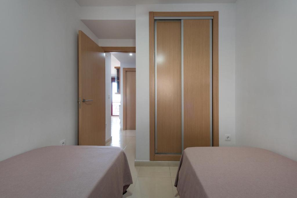 Postel nebo postele na pokoji v ubytování Blau d´Or Peñiscola