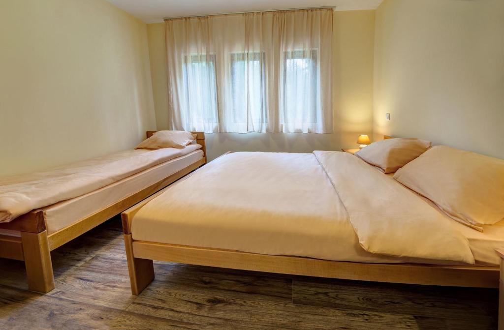 Letto o letti in una camera di Apartmani Bijelic