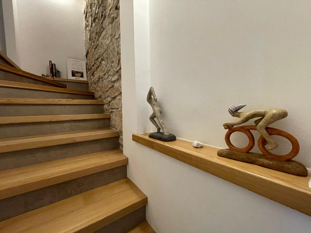 a staircase with a pair of scissors on a shelf at VILLA BERTO in Nedeščina