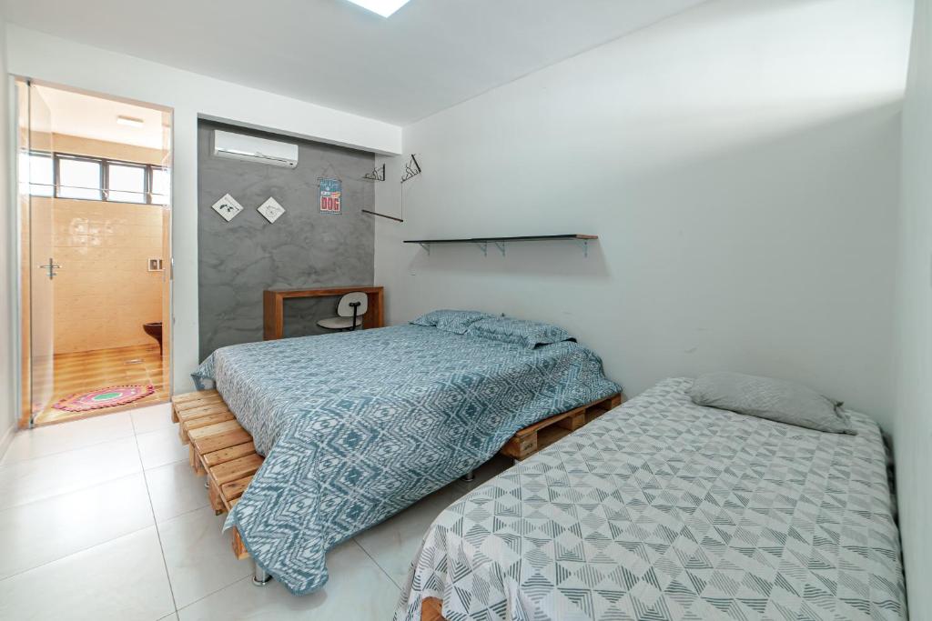 Cama ou camas em um quarto em Suite Moderna