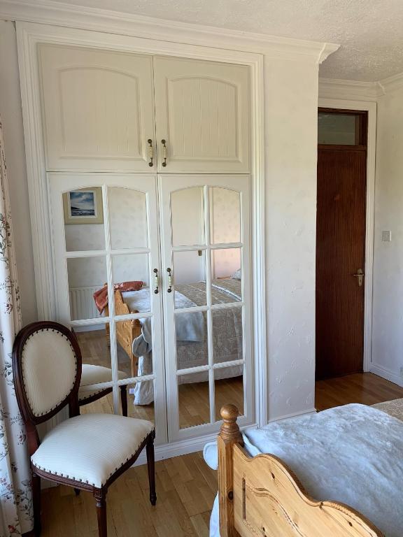 Postel nebo postele na pokoji v ubytování Kilcarragh House