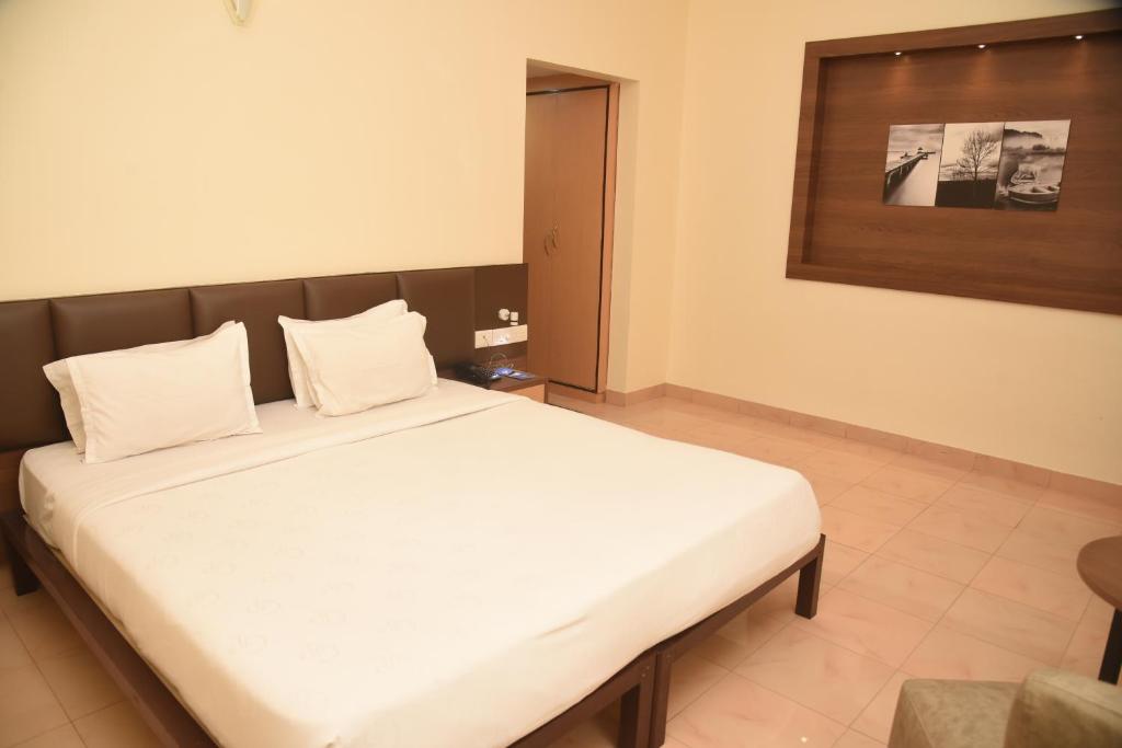 Postel nebo postele na pokoji v ubytování GOLDEN PARK HOTEL & RESORT