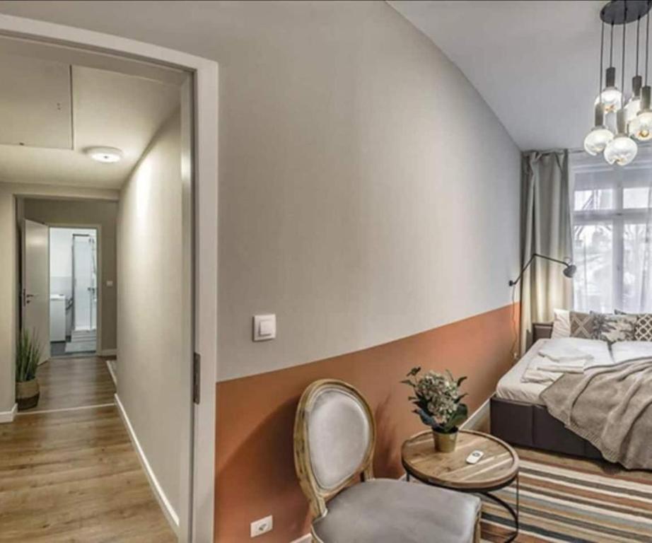 Posteľ alebo postele v izbe v ubytovaní Budapest True Gem Downtown next to Synagogue and Gozsdu garden area