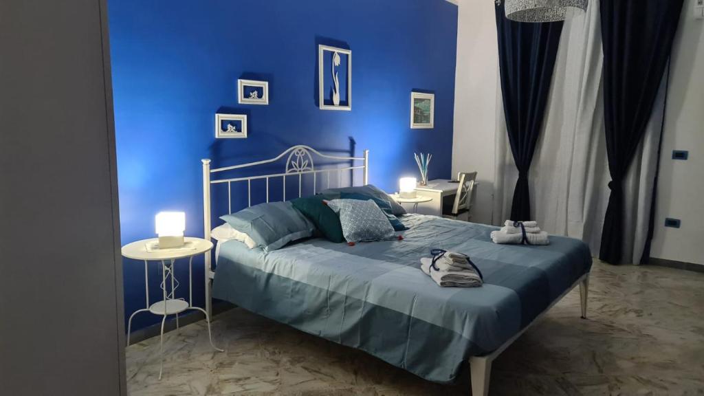 Postel nebo postele na pokoji v ubytování Pretty House Pompeii