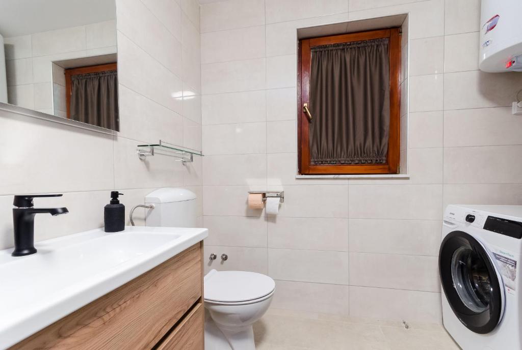 Koupelna v ubytování Apartment Slavko
