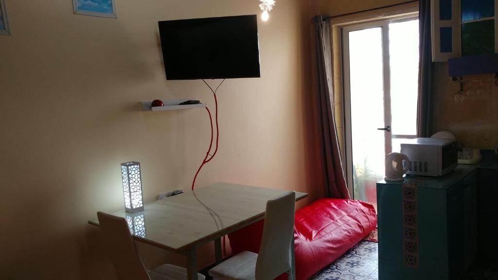 TV a/nebo společenská místnost v ubytování Triesti Home