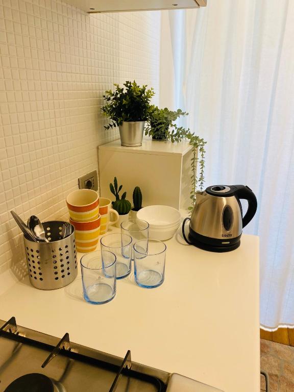 Kuchyňa alebo kuchynka v ubytovaní Chiara Guest House 34 - M4 Metro blu