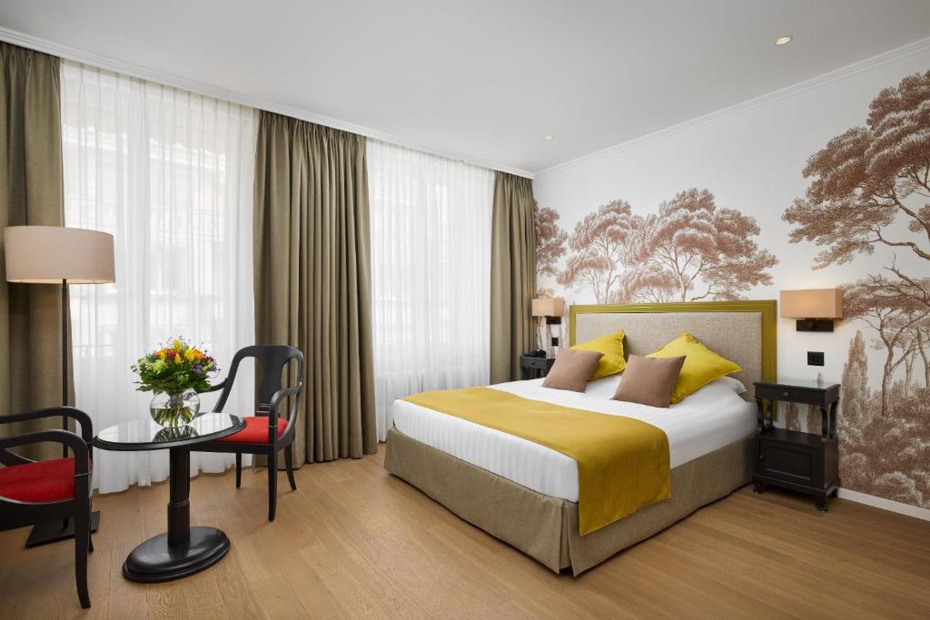 Postel nebo postele na pokoji v ubytování Hotel Victoria