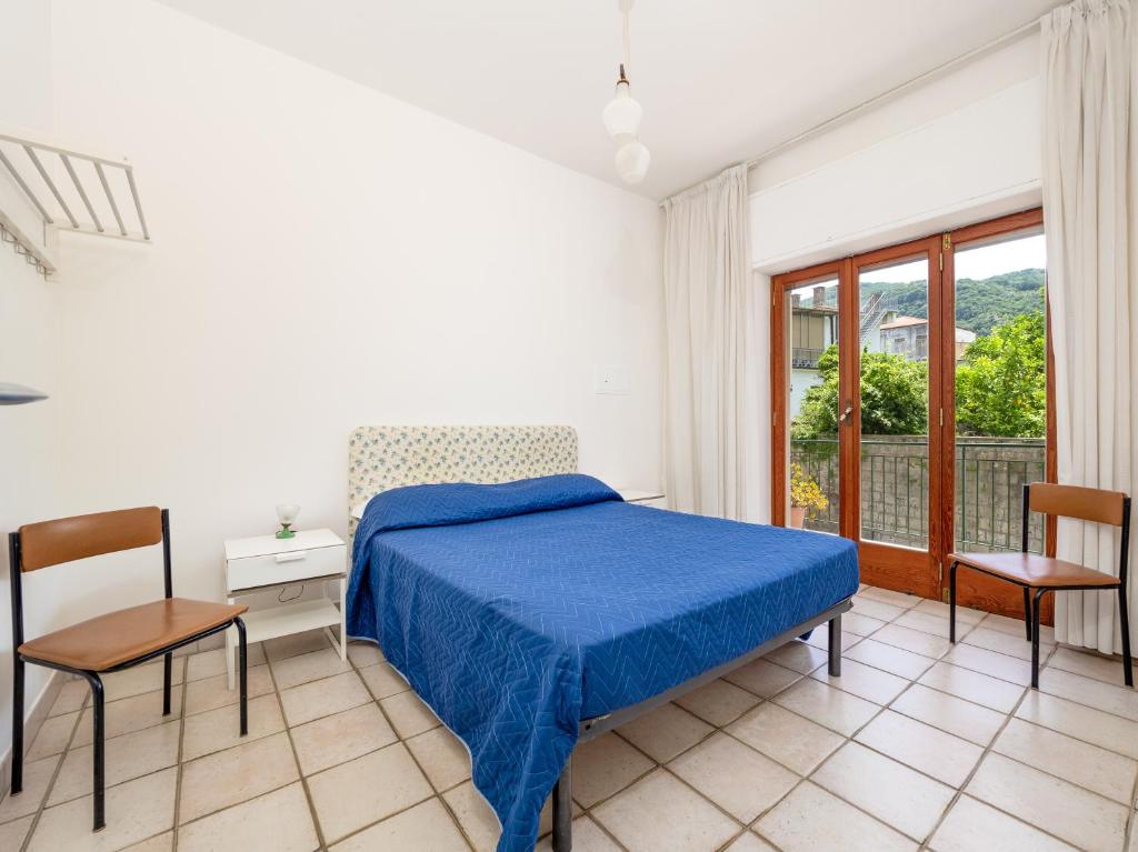 Łóżko lub łóżka w pokoju w obiekcie Marea Suite - De Vivo Realty Sorrento