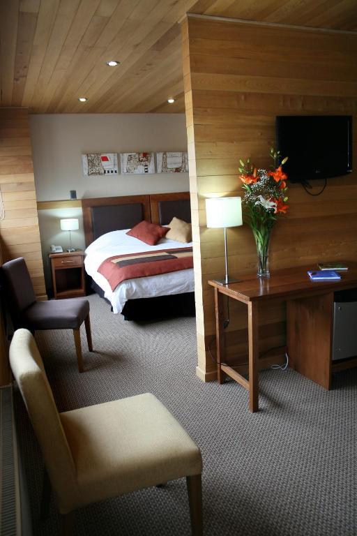 Postel nebo postele na pokoji v ubytování Puerto Chico Hotel