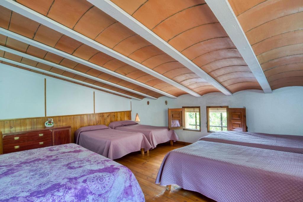Postel nebo postele na pokoji v ubytování La Vinya Pineda de Mar