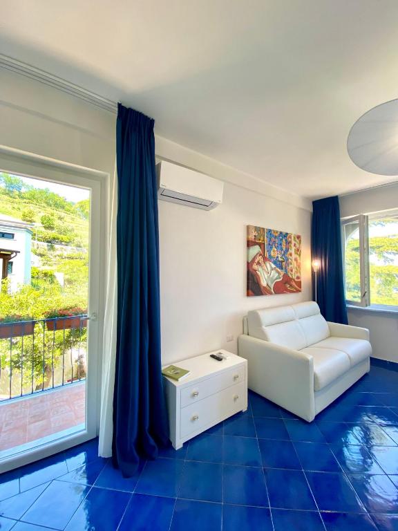 Postel nebo postele na pokoji v ubytování Residence Villa Giordano sea view Amalfi Coast