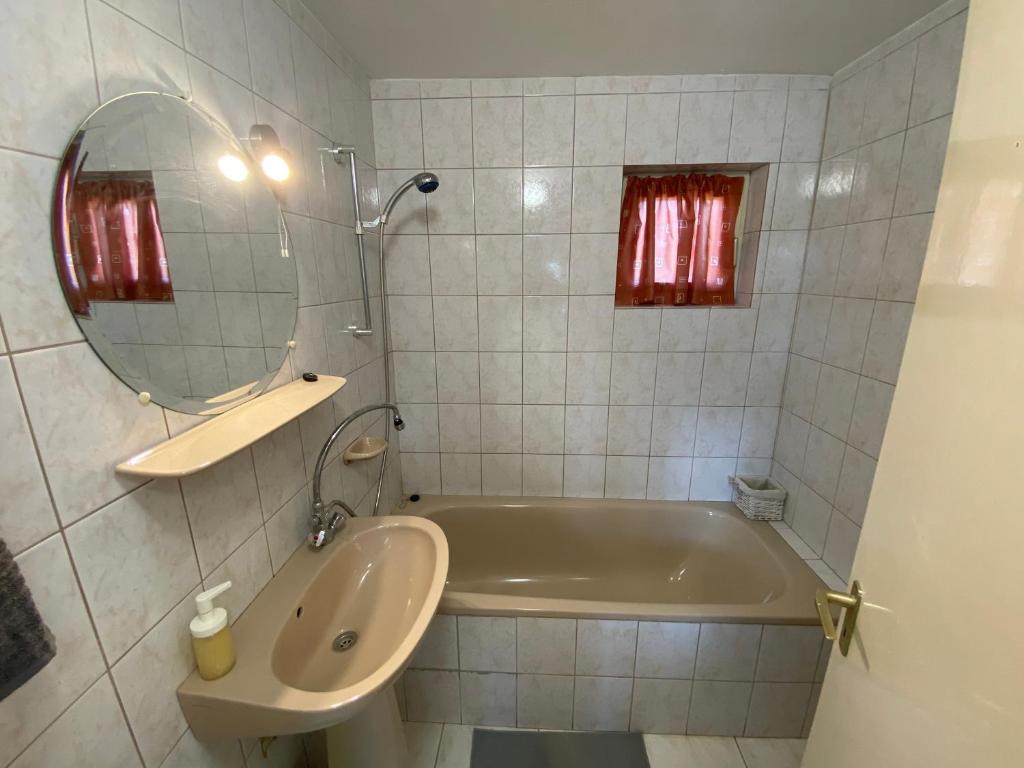 Kúpeľňa v ubytovaní Füge Vendégház