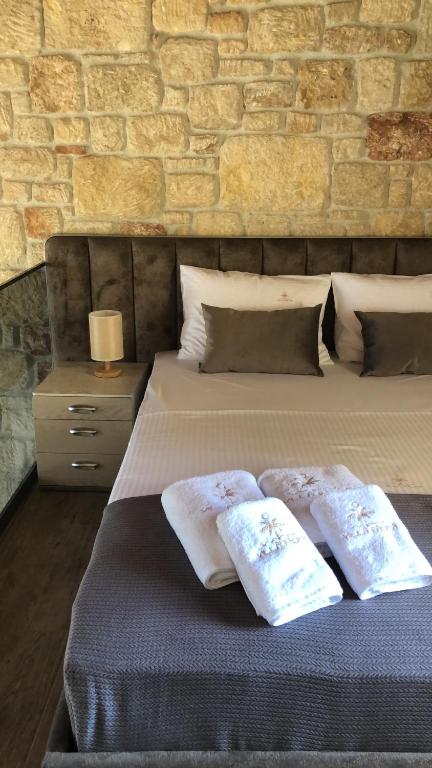 Ένα ή περισσότερα κρεβάτια σε δωμάτιο στο Villa Palma