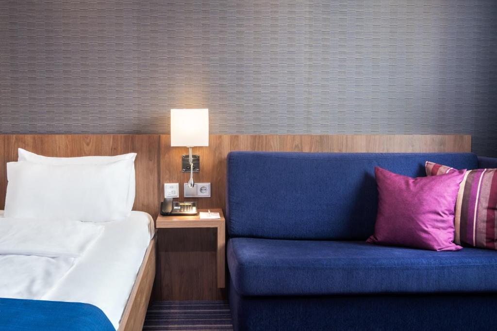 Postel nebo postele na pokoji v ubytování Holiday Inn Express Friedrichshafen by IHG