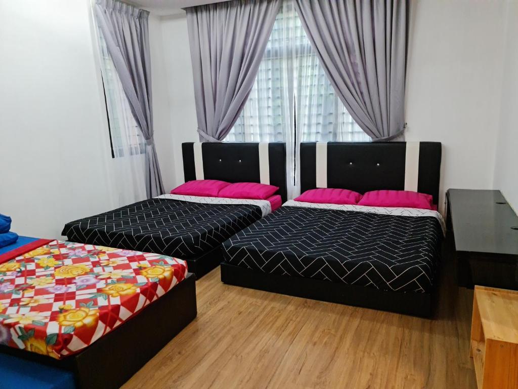 Postel nebo postele na pokoji v ubytování Pearl Residences Sleep 27