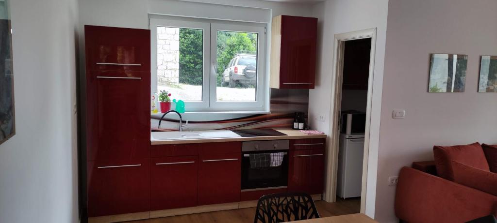 Kuchyň nebo kuchyňský kout v ubytování Apartment in an urban villa Kraljevica