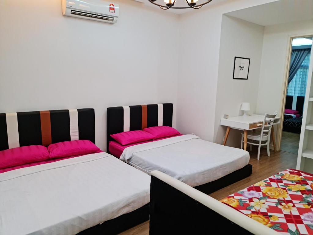 Postel nebo postele na pokoji v ubytování Pearl Residences Sleep 27