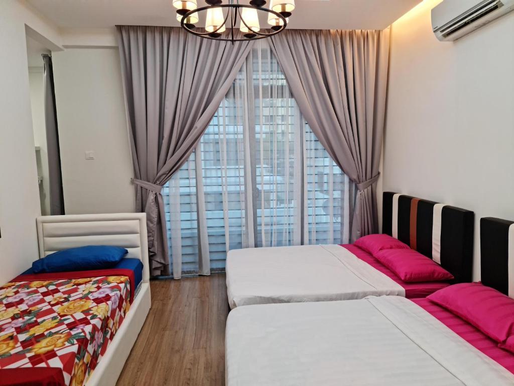 Postel nebo postele na pokoji v ubytování Pearl Residences Sleep 27