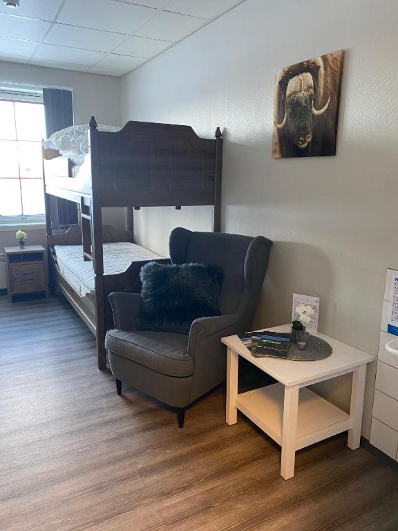 Postel nebo postele na pokoji v ubytování Basecamp Frich`s Hjerkinn