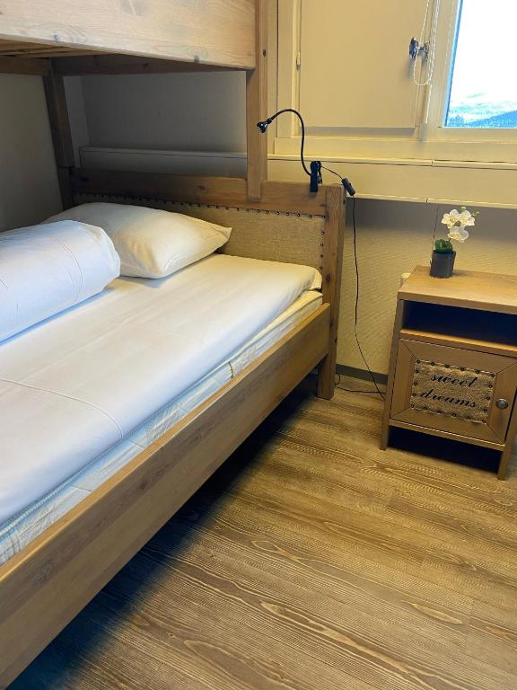 Postel nebo postele na pokoji v ubytování Basecamp Frich`s Hjerkinn