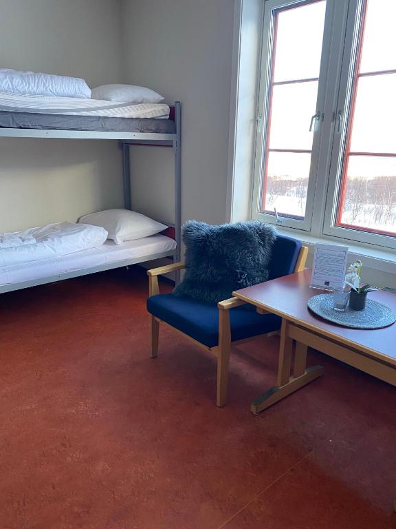 Postel nebo postele na pokoji v ubytování Basecamp Frich`s Hjerkinn