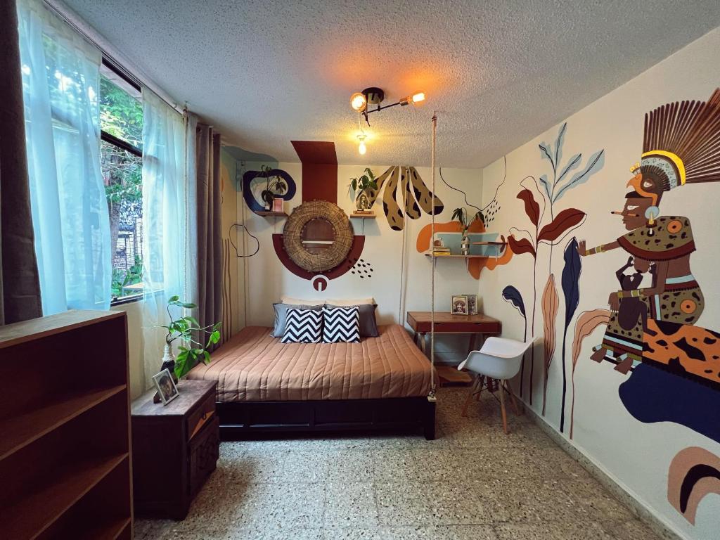 Postel nebo postele na pokoji v ubytování 13 Cielos Hostel & Coworking