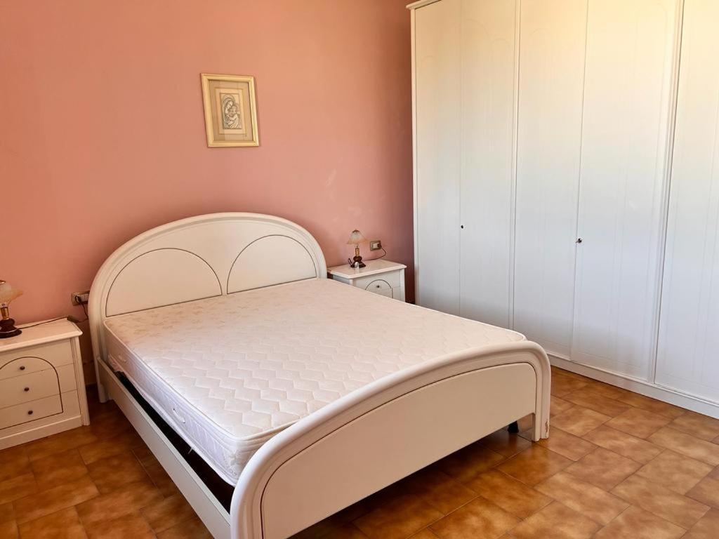 Posteľ alebo postele v izbe v ubytovaní Appartamento