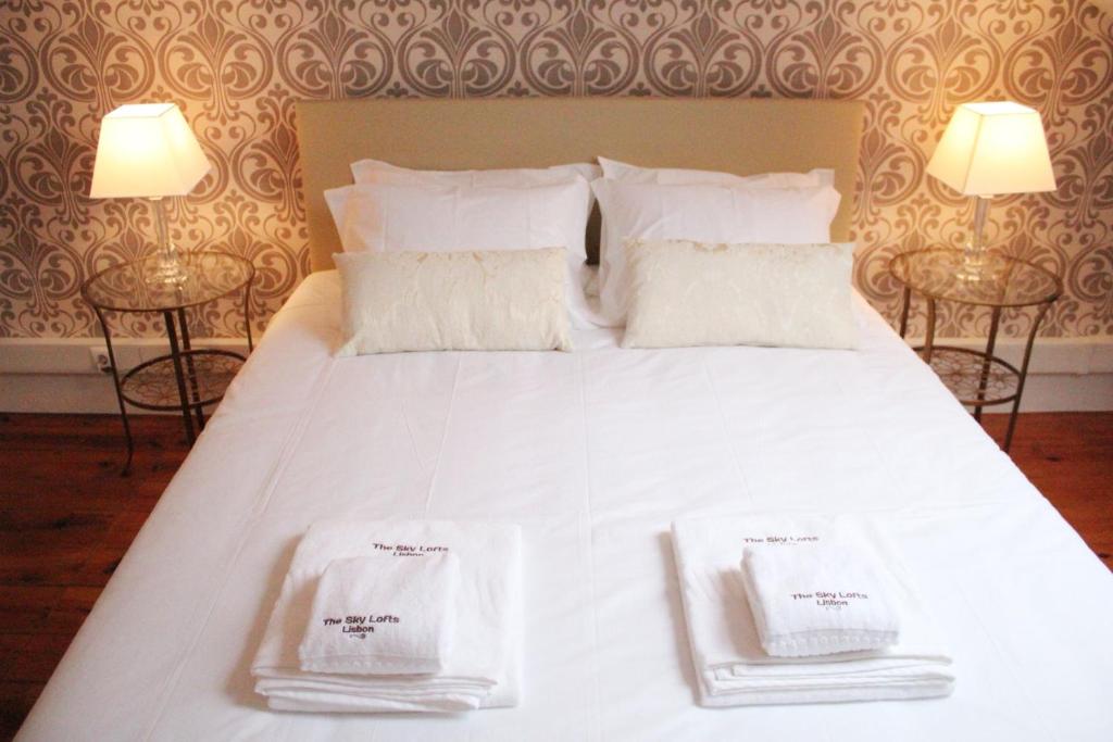 Postel nebo postele na pokoji v ubytování The Sky Lofts Lisbon - Guesthouse