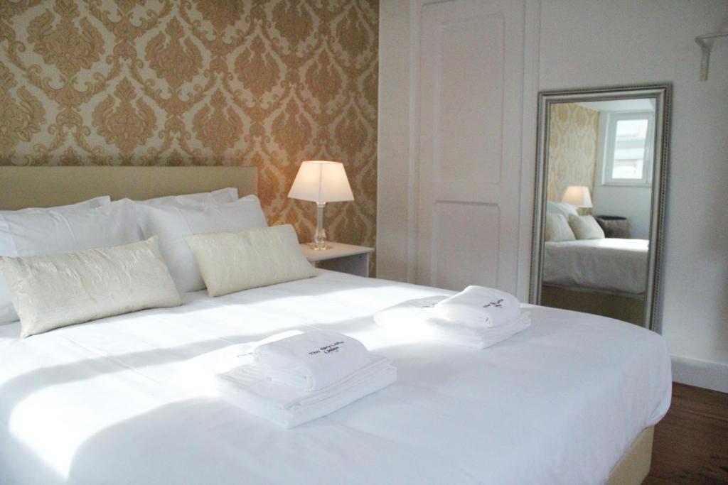 Postel nebo postele na pokoji v ubytování The Sky Lofts Lisbon - Guesthouse
