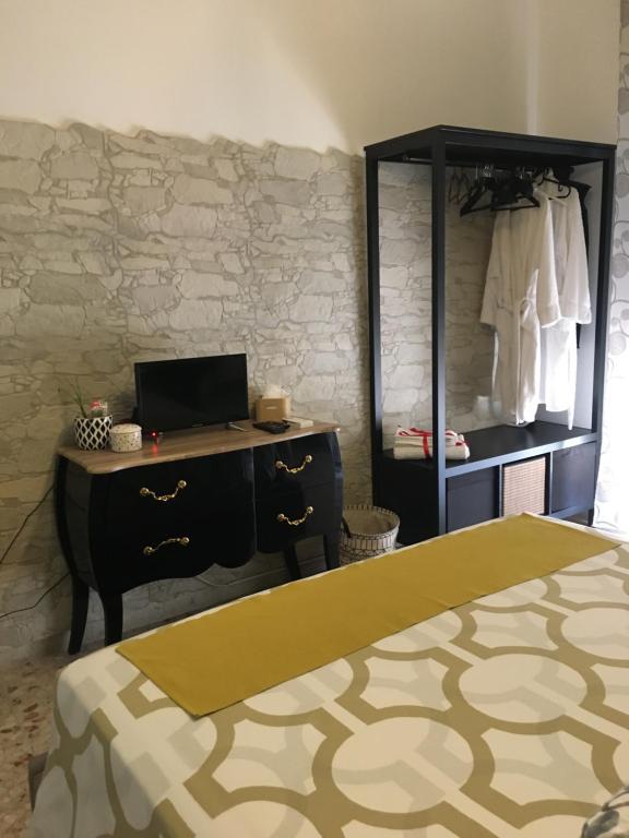 Posteľ alebo postele v izbe v ubytovaní Siracusa Vacanze