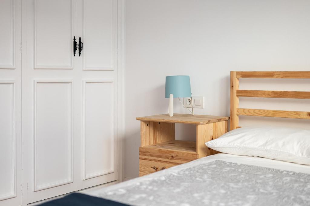 Postel nebo postele na pokoji v ubytování Casita del Bot