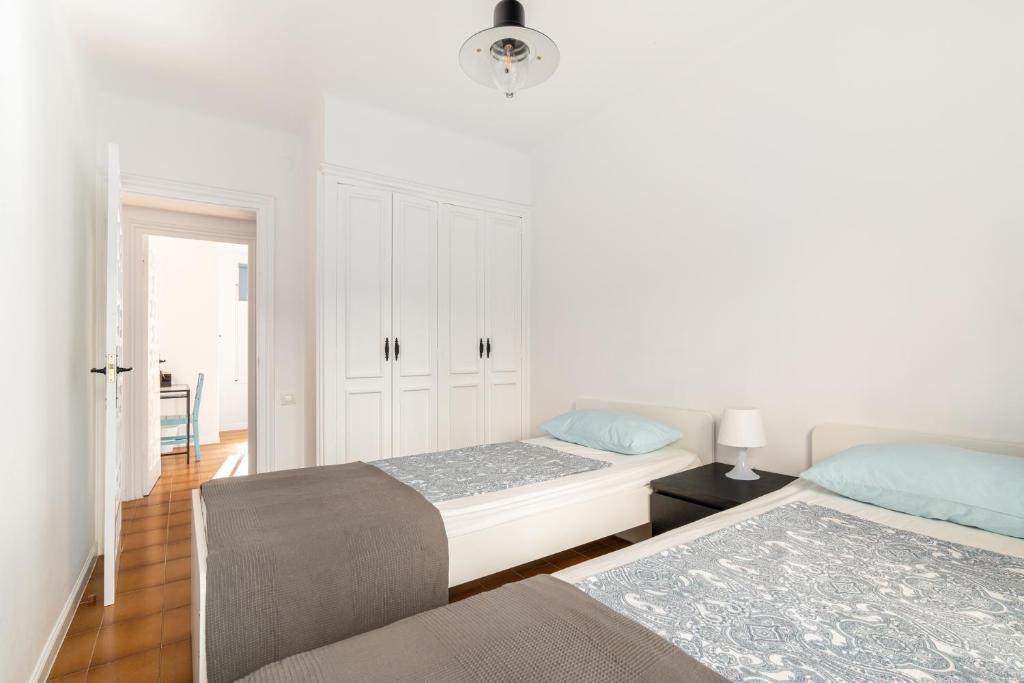 Postel nebo postele na pokoji v ubytování Casita del Bot